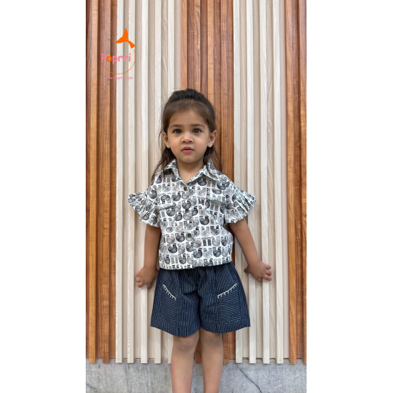 Printed shirt and striped shorts